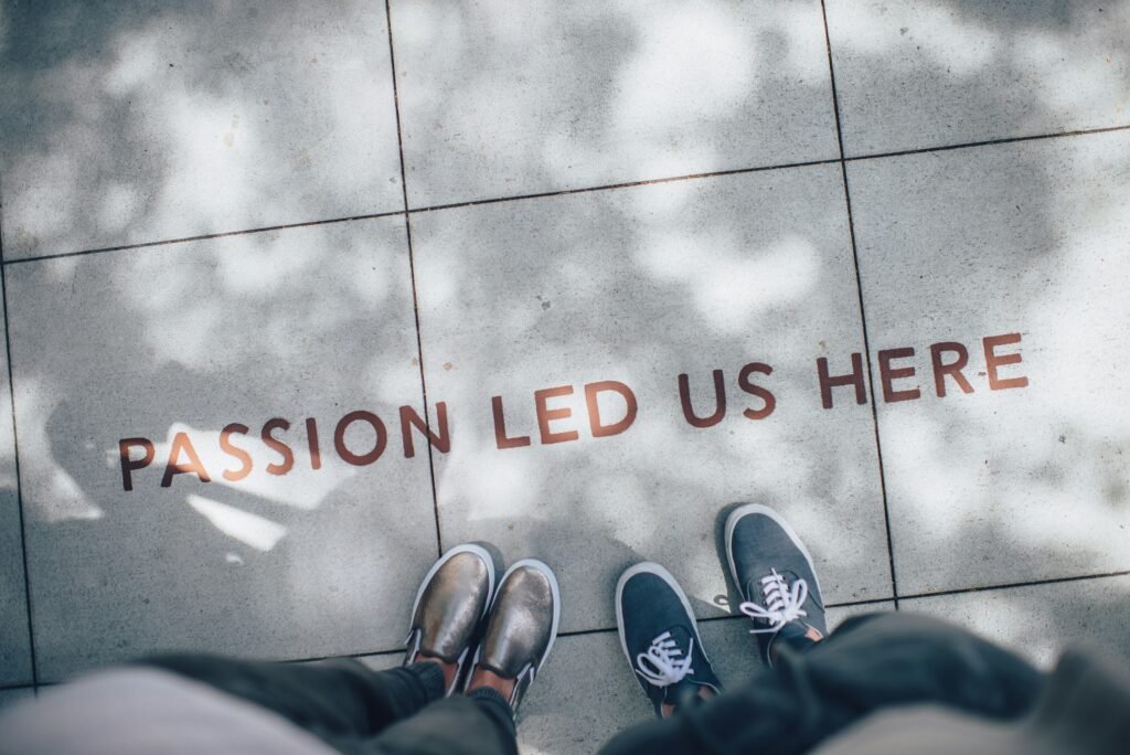cross walk that says 'passion led us here' for small teams